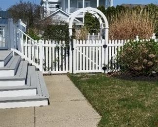 Limited amount of vinyl fencing; garden arch & gate