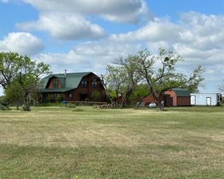 House sets off from the road. Turn right into drive way