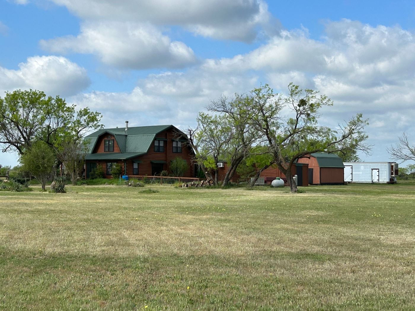 House sets off from the road. Turn right into drive way