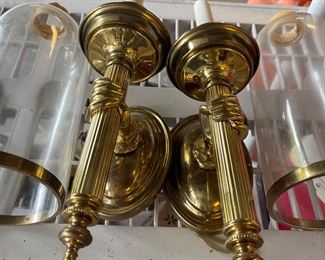 Sconces with hands holding column - fabulous! 