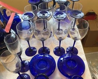 Candle holders, champagne flutes, wine glasses x16 , pitcher and vase