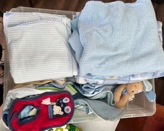 Lots of baby, blankets and bibs appeared to be unused