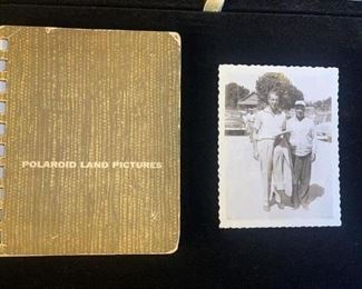 55 - 1955 New York Yankees Polaroid Land Picture Album 1955 New York Yankees Polaroid Land Picture Album. 16 photos, 3.25" x 4.25", includes two Joe DiMaggio photos, one he signed on the reverse. Includes baseball legends: Mickey Mantle, Billy Martin, Yogi Berra, Whitey Ford, Elston Howard, Casey Stengel, Hank Bauer, Phil Rizzuto and six others.
