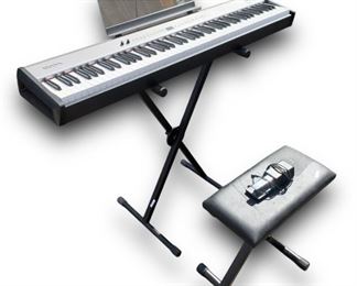 Roland Portable Digital Keyboard Model: FP2 w/ A Roland Foot Pedal, Stand, And A Keyboard Bench 