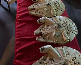 Millennium Falcons in various states of repair.