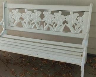 Heavy cast iron and wood daffodil garden bench