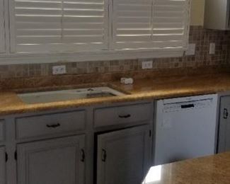 KraftMaid kitchen; plantation shutters