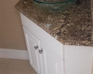 Corner bath vanity with glass vessel sink