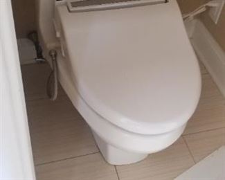 Toilet with CleanSense bidet