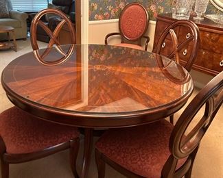 Thomasville Dining Table and 7 chairs and of course Leaves and pads. Glass Top
