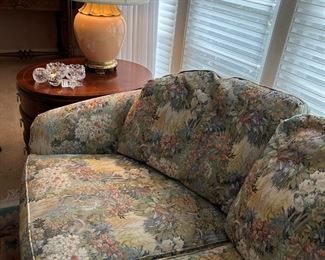 Very comfortable floral sofa and we have 2 of the beautiful Chapman Lamps
