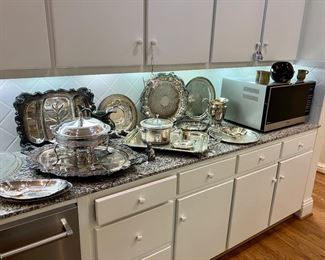 Ornate silverplate serving pieces