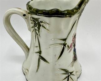 Antique Japanese Hand-Painted Moriage Porcelain Pitcher
Lot #: 20