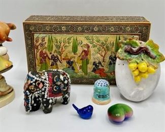Vintage Figurines & Decor: Hummel, Stone Inuit Fisherman, Persian Inlaid Box & More
Lot #: 79