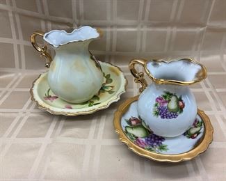 LOT 005- Pair of decorative bowl and pitchers one is 5.5 in and the other is 6.5 in. tall $35