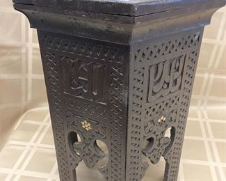 LOT 013- Moroccan stool AS-IS  It has a split top. 13in wide 16in tall $125