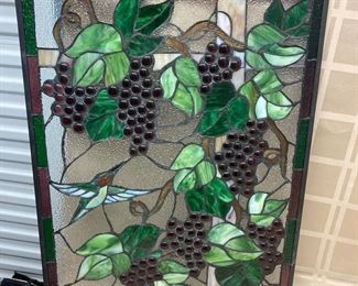 LOT 026- Decorative glass with hummingbirds and grapes 25in by 20in $65