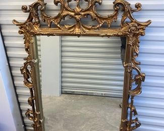 LOT 029- Large vintage gold color mirror from Carolina Mirror Company. Made in USA. AS-IS with repaired damage. 54in by 33in $325