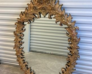 LOT 030- Large vintage oval gold colored mirror from Turner Manufacturing. Made in USA. 52 in by 33in. $475