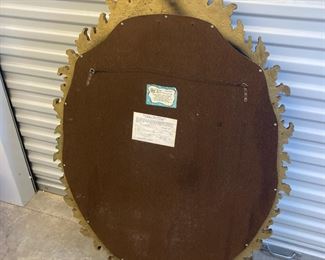 LOT 030- Large vintage oval gold colored mirror from Turner Manufacturing. Made in USA. 52 in by 33in. $475