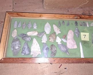 SEVERAL SHOWCASES FULL OF ARROWHEADS