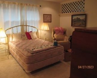 Full Size bed.  Gold metal headboard and frame