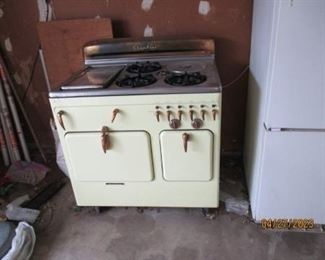 Chambers Gas Model 61C - 1950's - Stove.  Copper and Yellow.  Attachments included.  Needs an appliance person to thoroughly check and clean. 