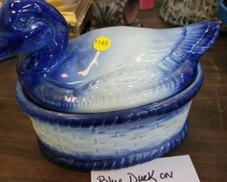 BLUE DUCK ON BASKET