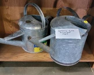 TWO GALVANIZED WATERING CANS