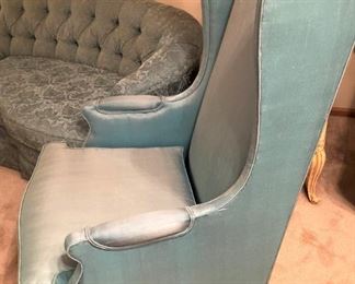 One of two wingback chairs