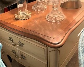 One of two Provincial side tables