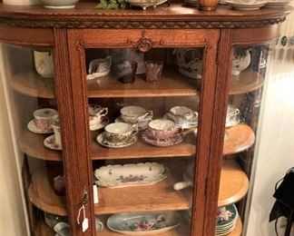 Another antique display cabinet; many vintage dishes