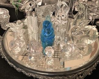 Mirrored pedestal; small glass animals