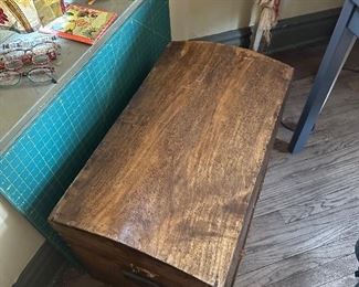 Wooden humpback trunk.