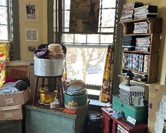 Art, FLAX clothing jammed packed inside the oversized wooden primitive blanket bin.