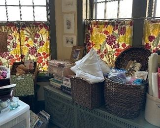 Oversized baskets, crafting supplies, knitting needles and crochet needles.
