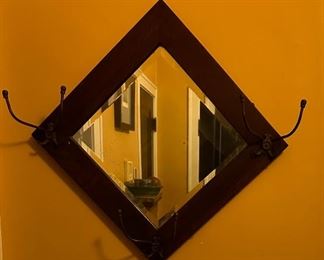 Arts and Crafts Mission mirror with hooks.