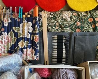 Knitting and crochet needles, yarn and crafting supplies.
