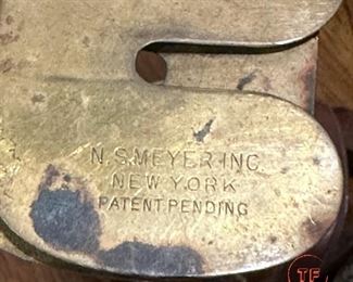 WWI Spurs (A.B. August BUERMANN), WWI Military Coat Buttons (Waterbury Button Co.), and WWI Brass Button Polisher (N.S. Meyer Inc.)