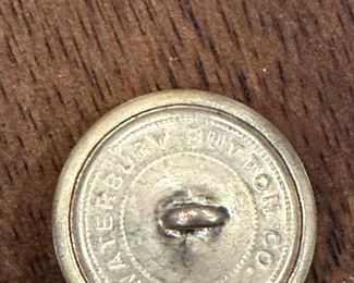 WWI Spurs (A.B. August BUERMANN), WWI Military Coat Buttons (Waterbury Button Co.), and WWI Brass Button Polisher (N.S. Meyer Inc.)