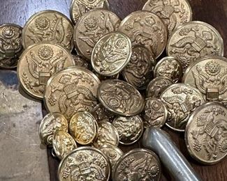 WWI Spurs (A.B. August BUERMANN), WWI Military Coat Buttons (Waterbury Button Co.), and WWI Brass Button Polisher (N.S. Meyer Inc.)