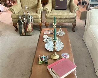 Two matching wing back chairs and a Bassett Furniture Co. French Provincial coffee table.  There are also 2  Bassett  French provincial matching side tables