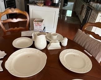 Set of Mikasa dinnerware with accessory items. Retail is $50 for 4 piece place setting.