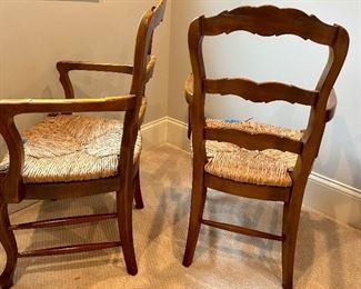 2 Rush Seat Solid Walnut French Country Dining 2 Arm Chairs 
22s x 16.5d x 38h (17” floor to seat)
2 have small damage to rush seat on front $75ea
All 4 for $300

