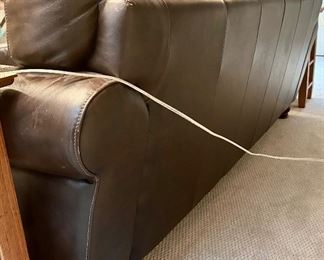 Leather Sofa with grommet accents
88w x 37d x 31h (18” floor to seat)
$495