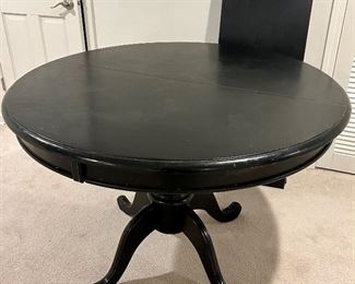 Black 45”Rnd x 32”h with 17”w leaf painted wood pedestal table $95