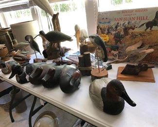 Carved decoys and birds