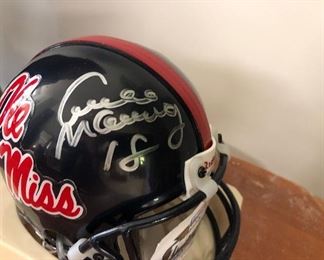 Riddell signed Archie Manning  Ole Miss mini helmet with authentication mark.  This piece is in original packaging. 