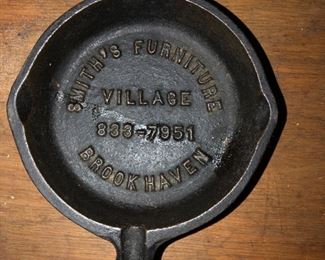 Small advertising piece- cast iron ashtray 