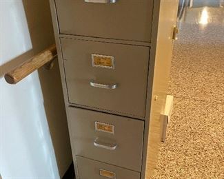 Multiple two and four drawer file cabinets